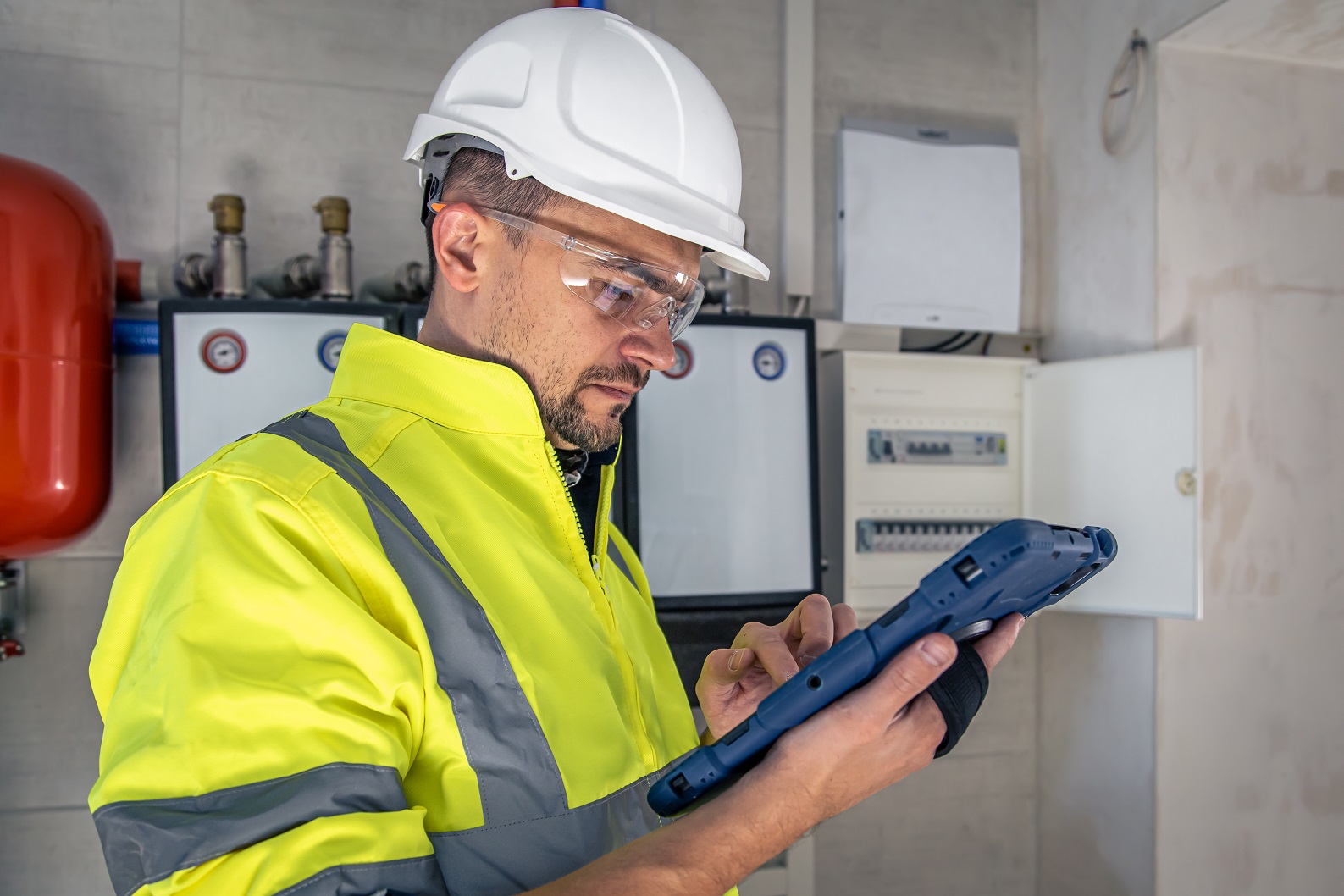 Maintenance worker with tablet